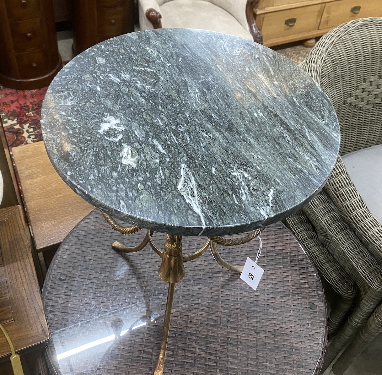 A circular gilt metal marble topped occasional table, diameter 43cm, height 59cm